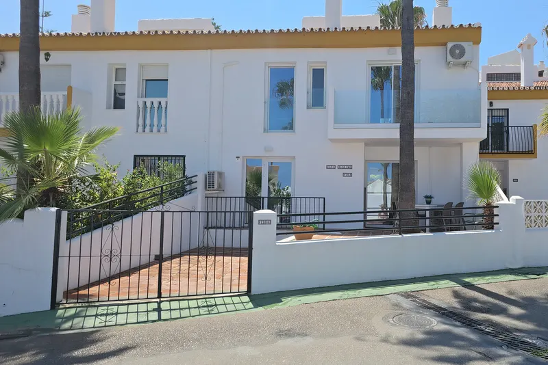 Entrance with patio and private parking